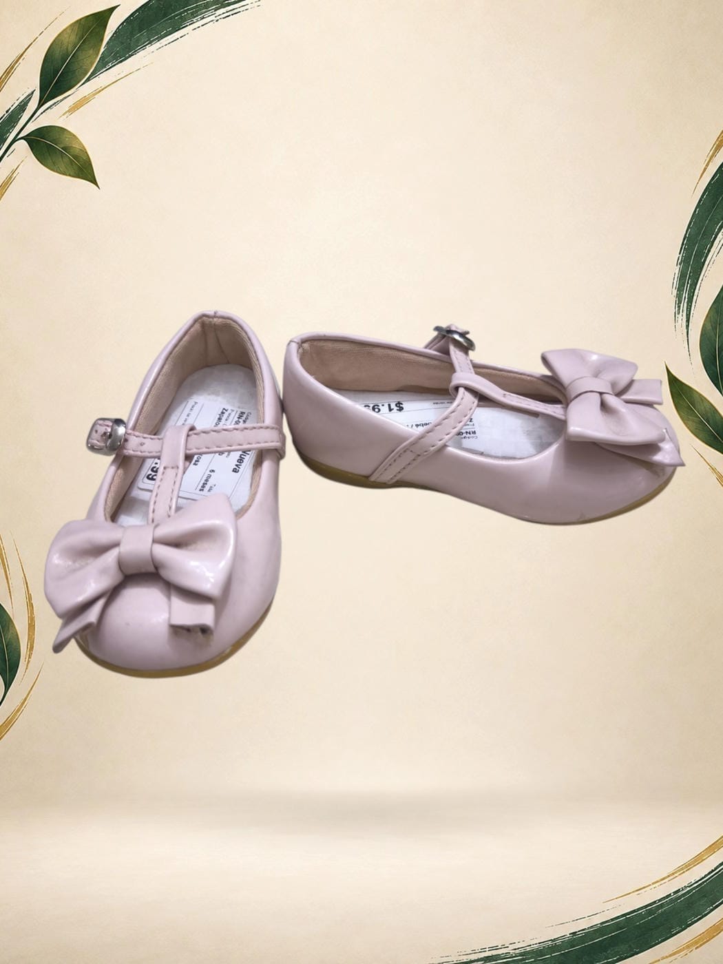 Vista frontal de Zapatos de bebé